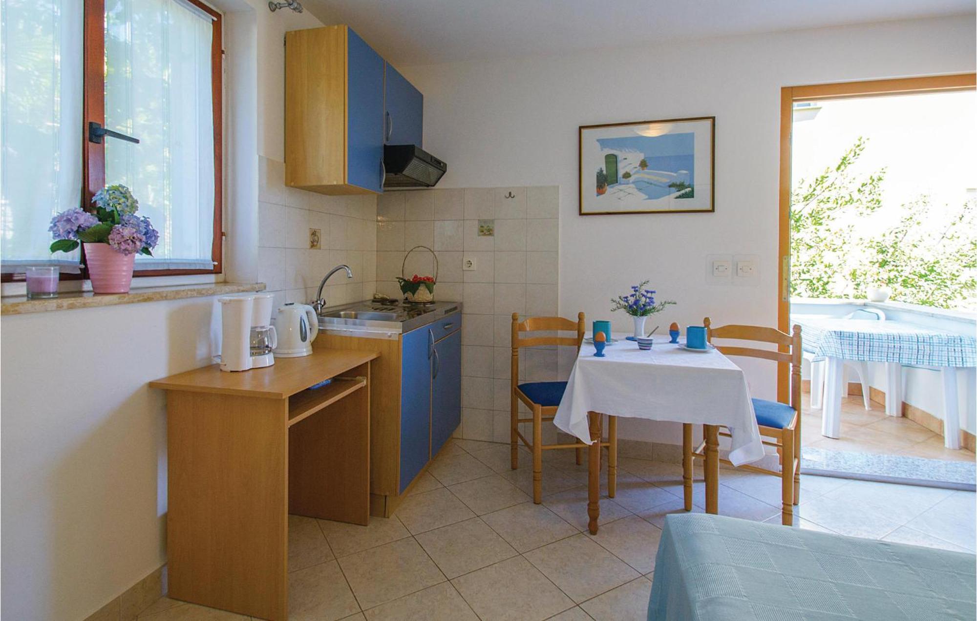 Beautiful Apartment In Rabac With Kitchen Exterior foto